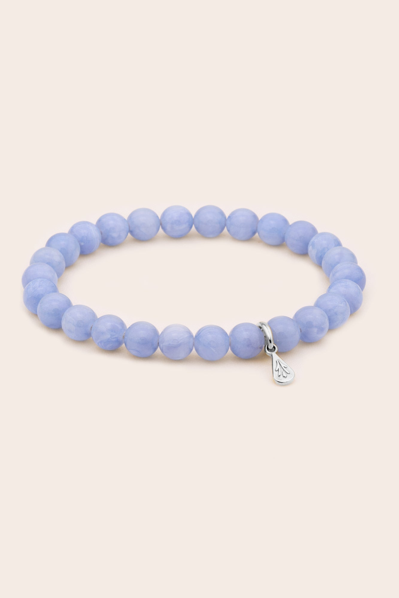 Light blue lace agate beaded bracelet on a white background