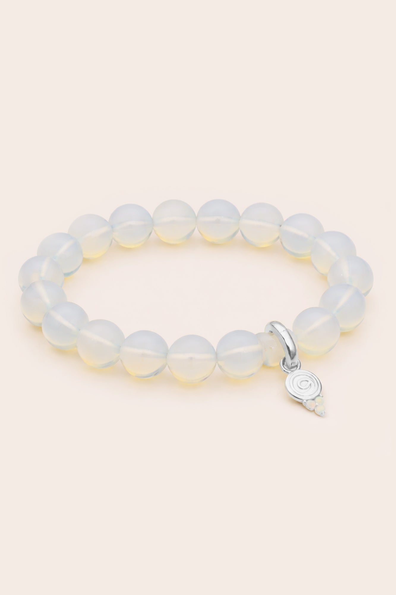 opal Beaded bracelet with a silver charm on a white background
