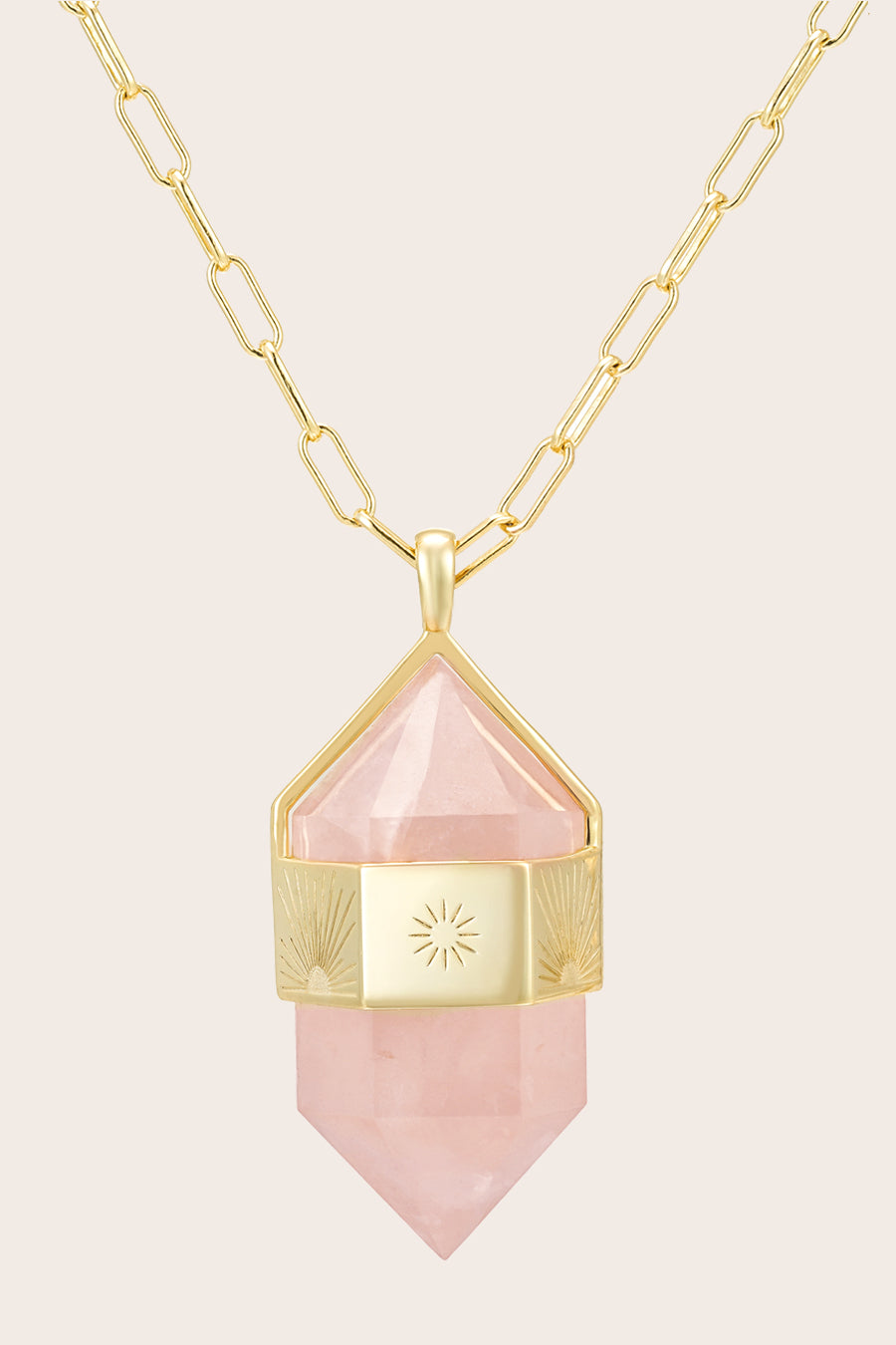 Rose Quartz Pendant Necklace on crease background
