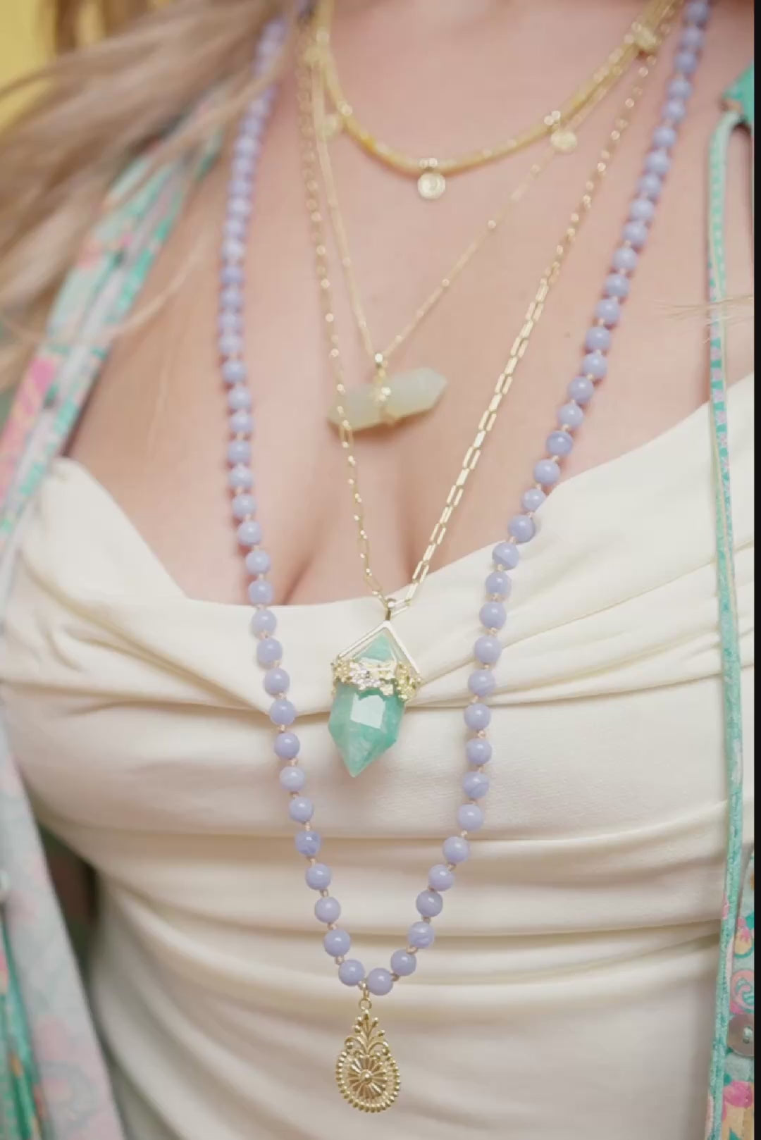 model wearing crystal gemstone jewellery