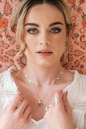pretty layered sterling silver and peach moonstone necklaces
