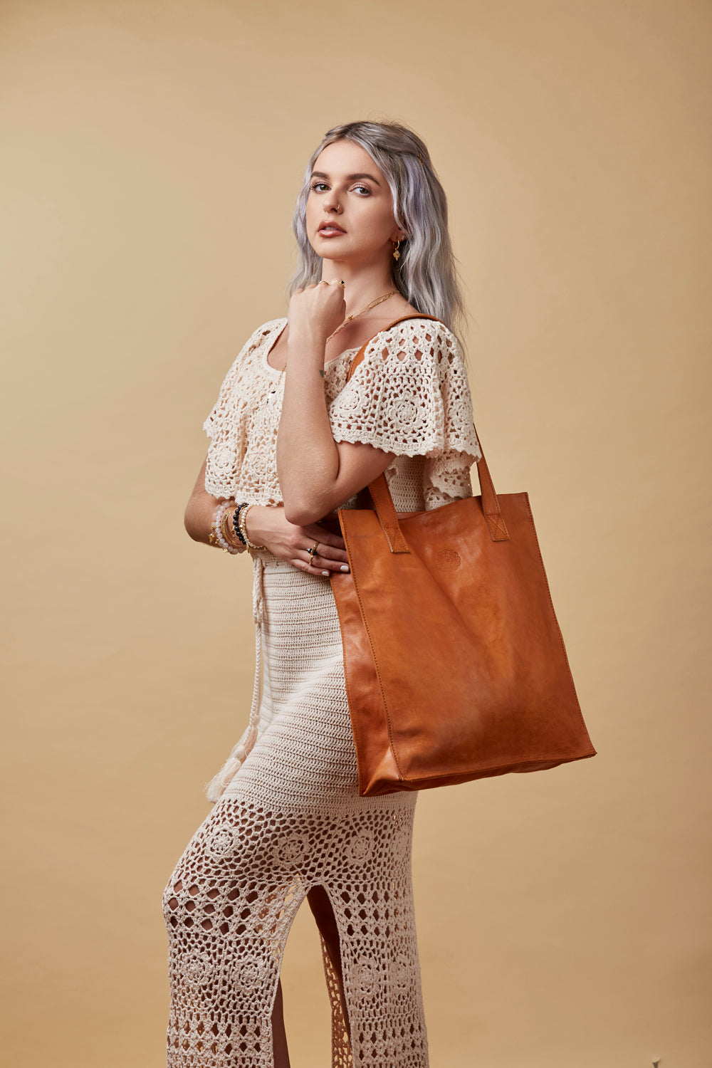 Tan Leather Tote Bag on Cream Background
