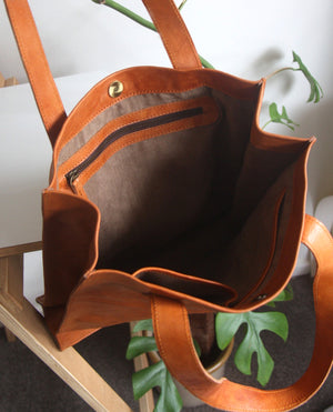 Tan vegan leather tote bag open to see inside
