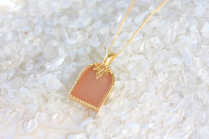 pink and gold arch necklace