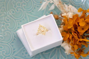 gold opal lattice ring in box