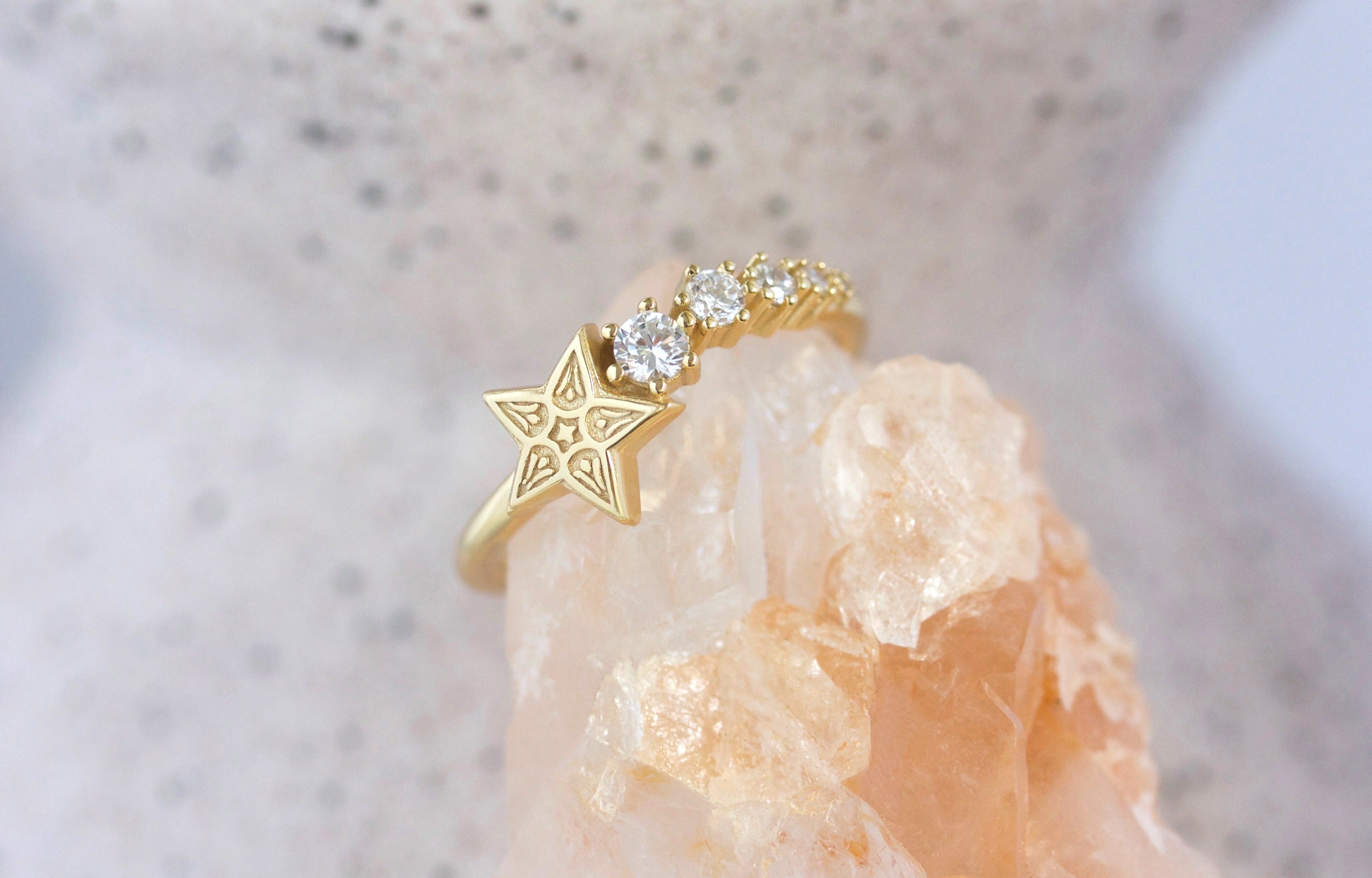 Gold star ring on crystal